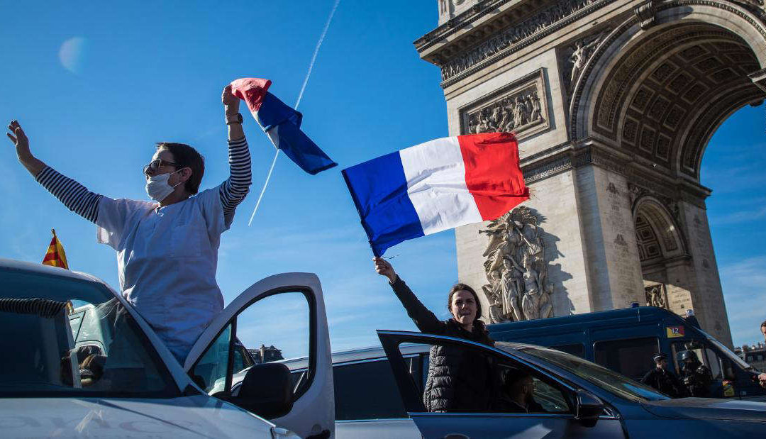 ‘Freedom Convoy’ protesters enter Paris and block traffic before they’re dispersed with tear gas